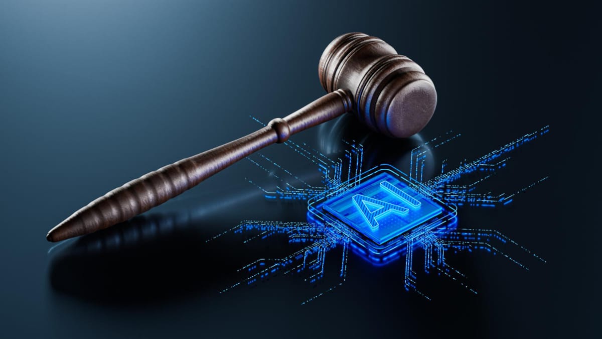 A gavel beside a glowing AI microchip.